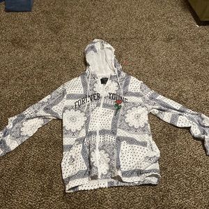 I am selling a thing jacket that has bandana patterns on it.